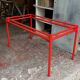 Custom modernist table, steel and earthenware.