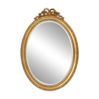 Oval shaped carved gilded Baroque mirror with beveled glass, Belgium