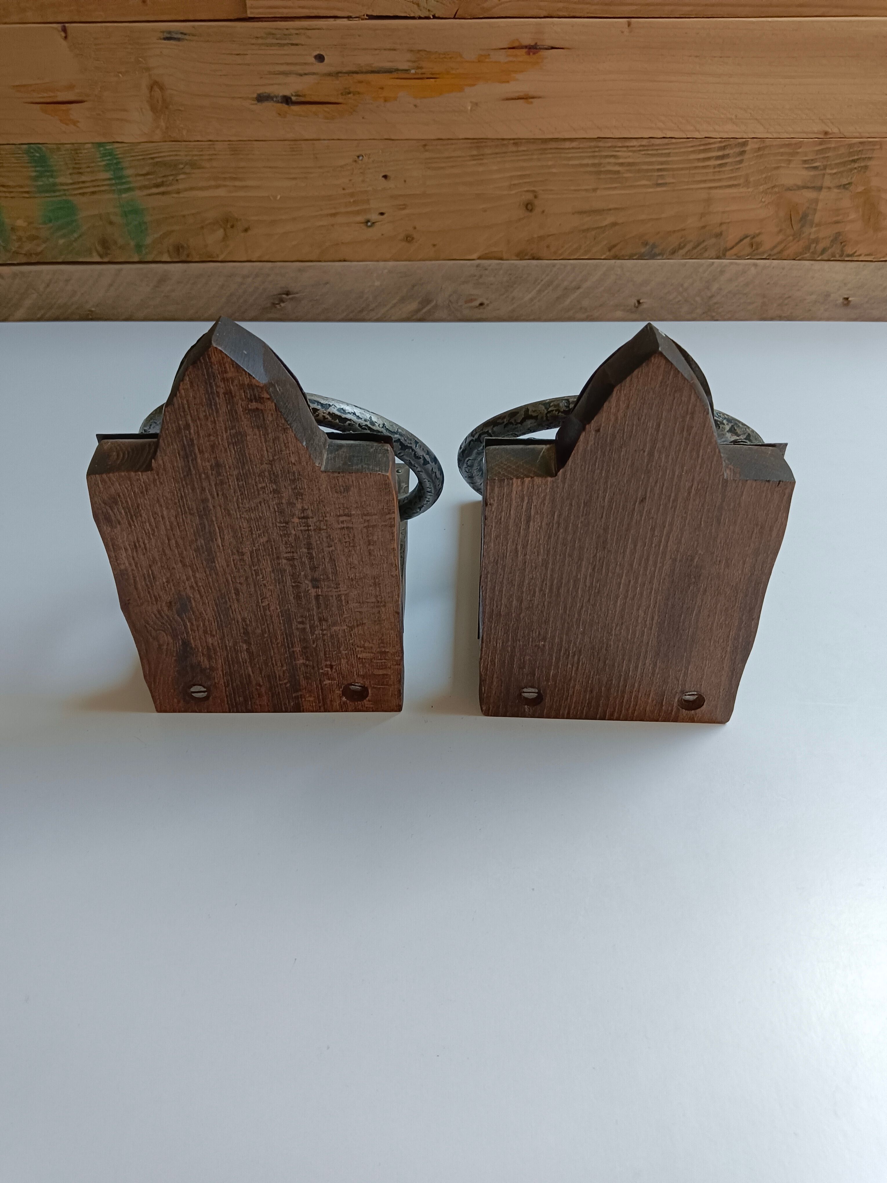 Medieval-style bookends, antique door handle.