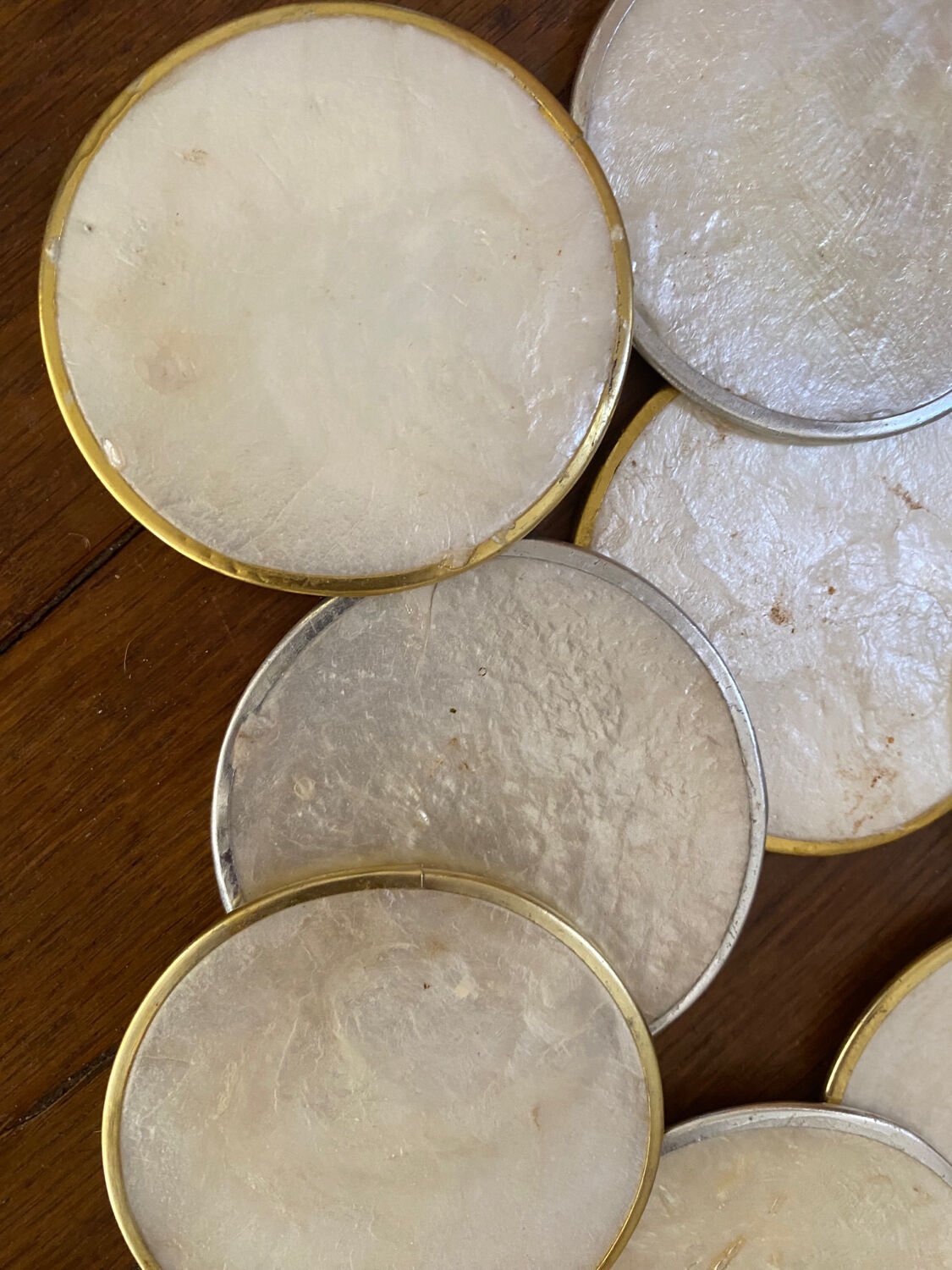 Set of 12 coasters in mother-of-pearl and gilded metal