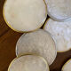Set of 12 coasters in mother-of-pearl and gilded metal