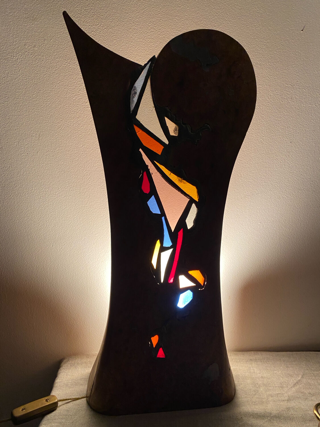 Carved wooden lamp and stained glass