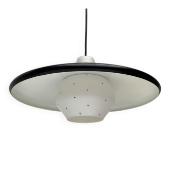 Minimalist metal and glass pendant lamp in mid-century style.