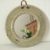 Artisanal round mirror in vintage green sandstone signed