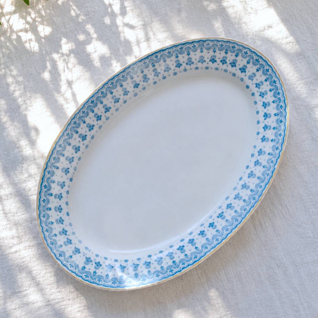 Grand plat ovale ancien de 1909 en porcelaine Oscar Schaller