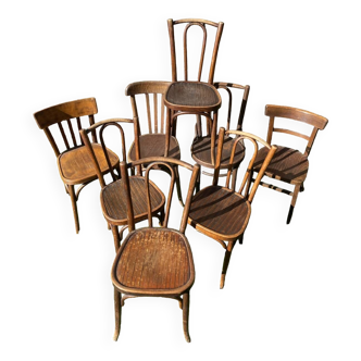 Set of 8 mismatched bistro chairs from the 60s