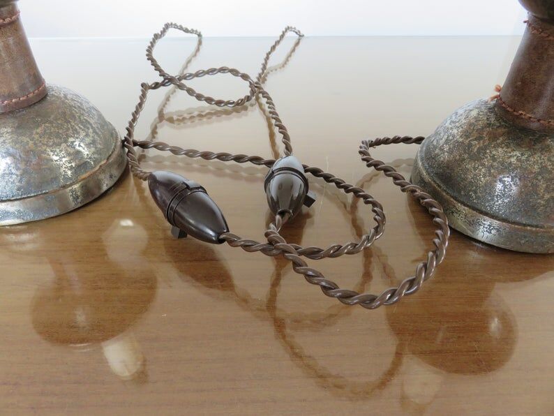 Pair of hammered raw steel and leather lamps 40 50s