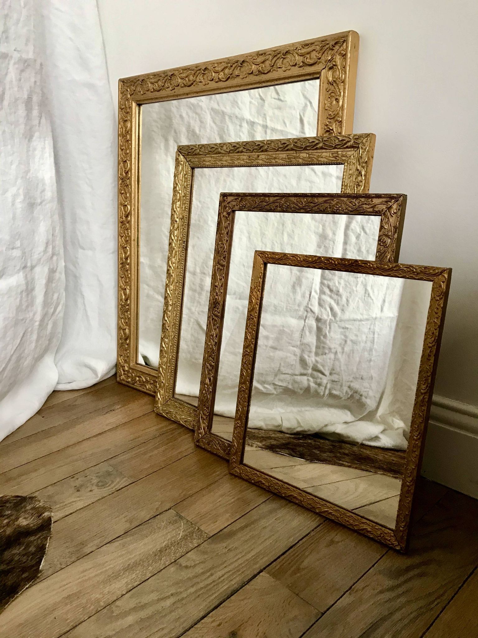 set of 4 mirrors in wood and gilded stucco early 20th century