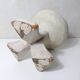 antique small tripod bench/stool in solid carved brutalist wood