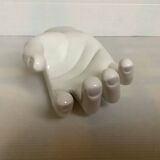 Coat hook representing a hand