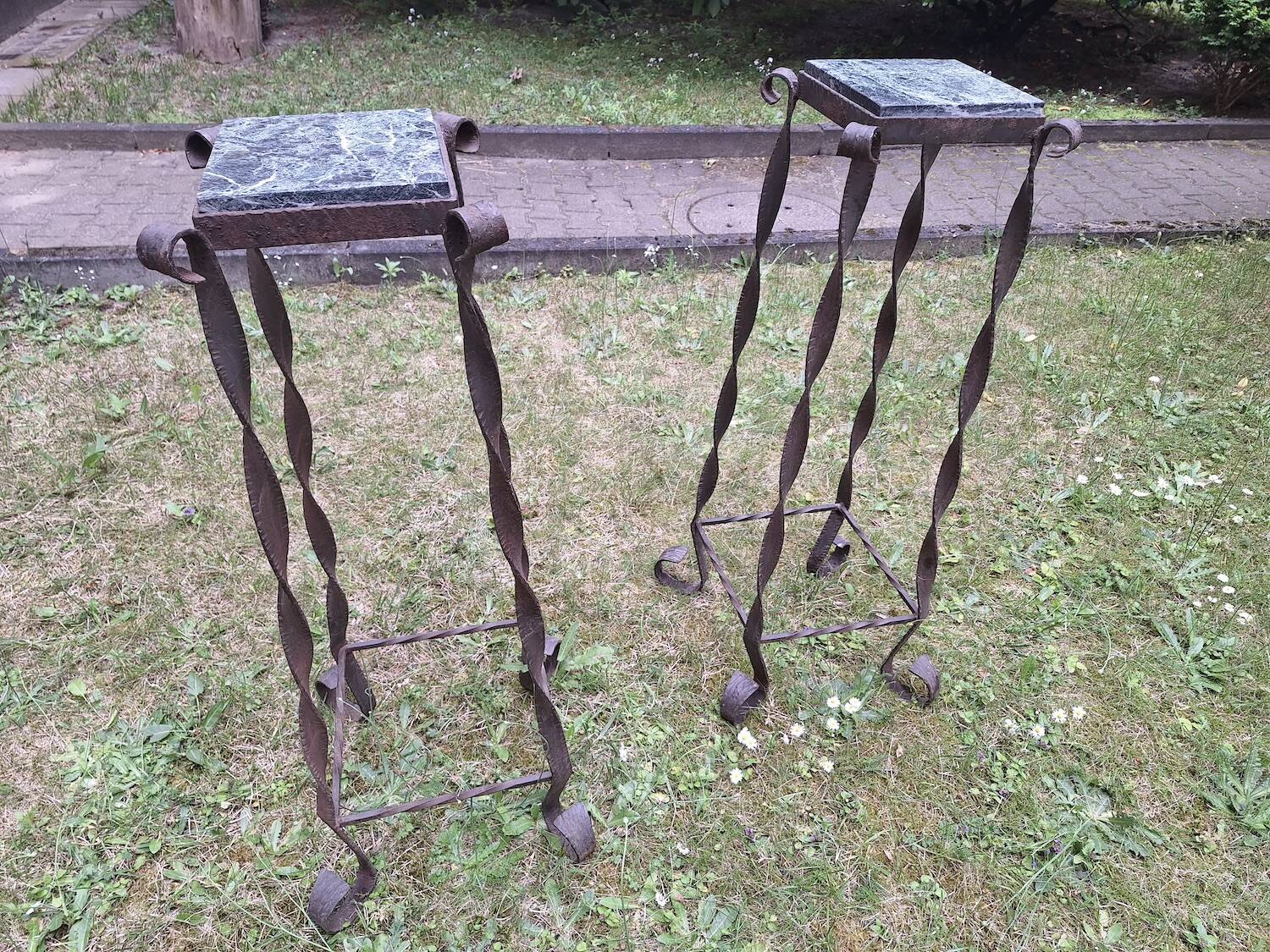 Pair of Brutalist patinated iron and veined marble columns, 1960s