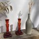 Pair of amber glass candlesticks