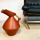 Studio pottery jug floor vase in terracotta and bamboo handle Germany 1950s