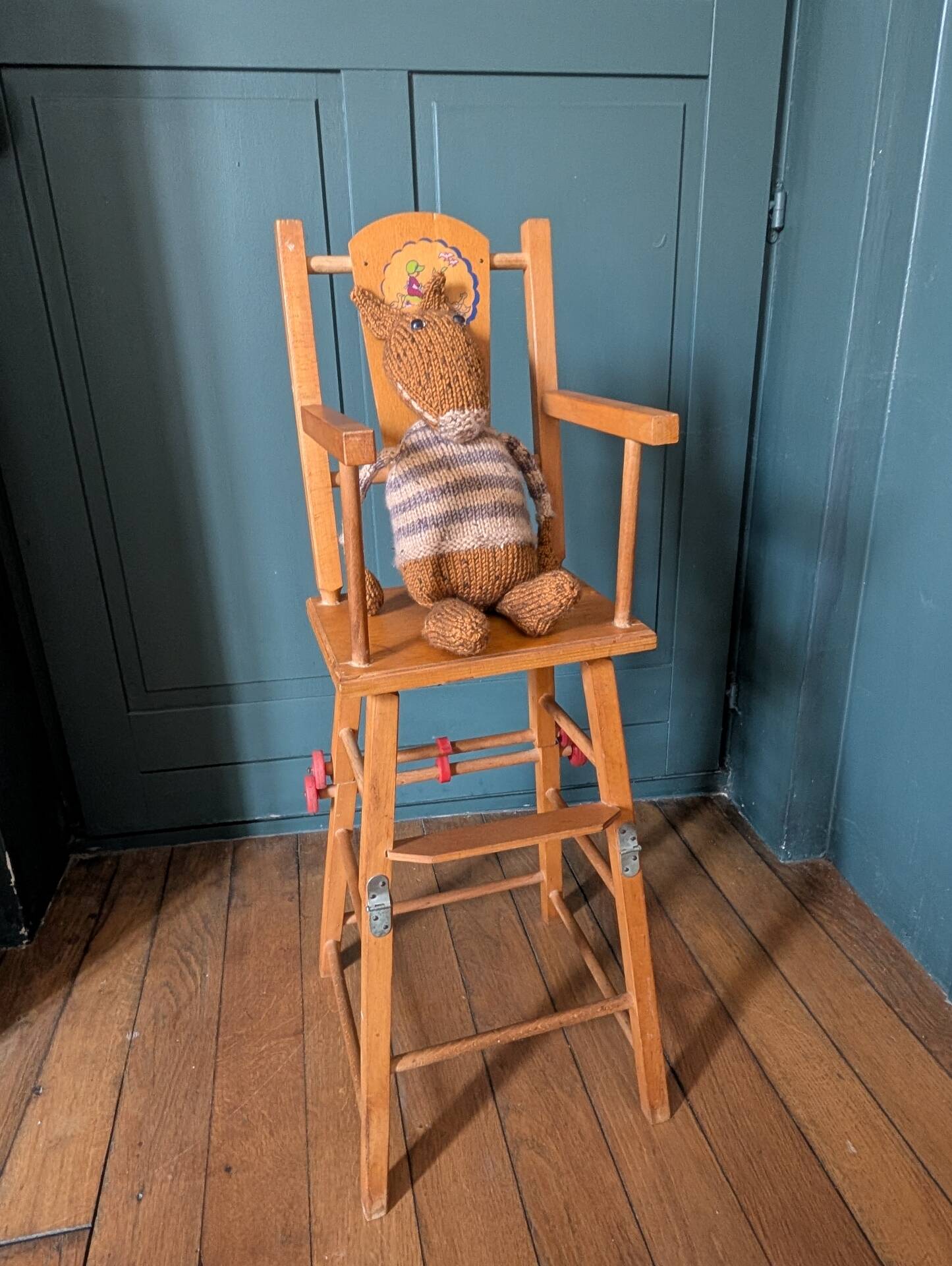 Doll high chair in wood – 1970s, foldable and on wheels