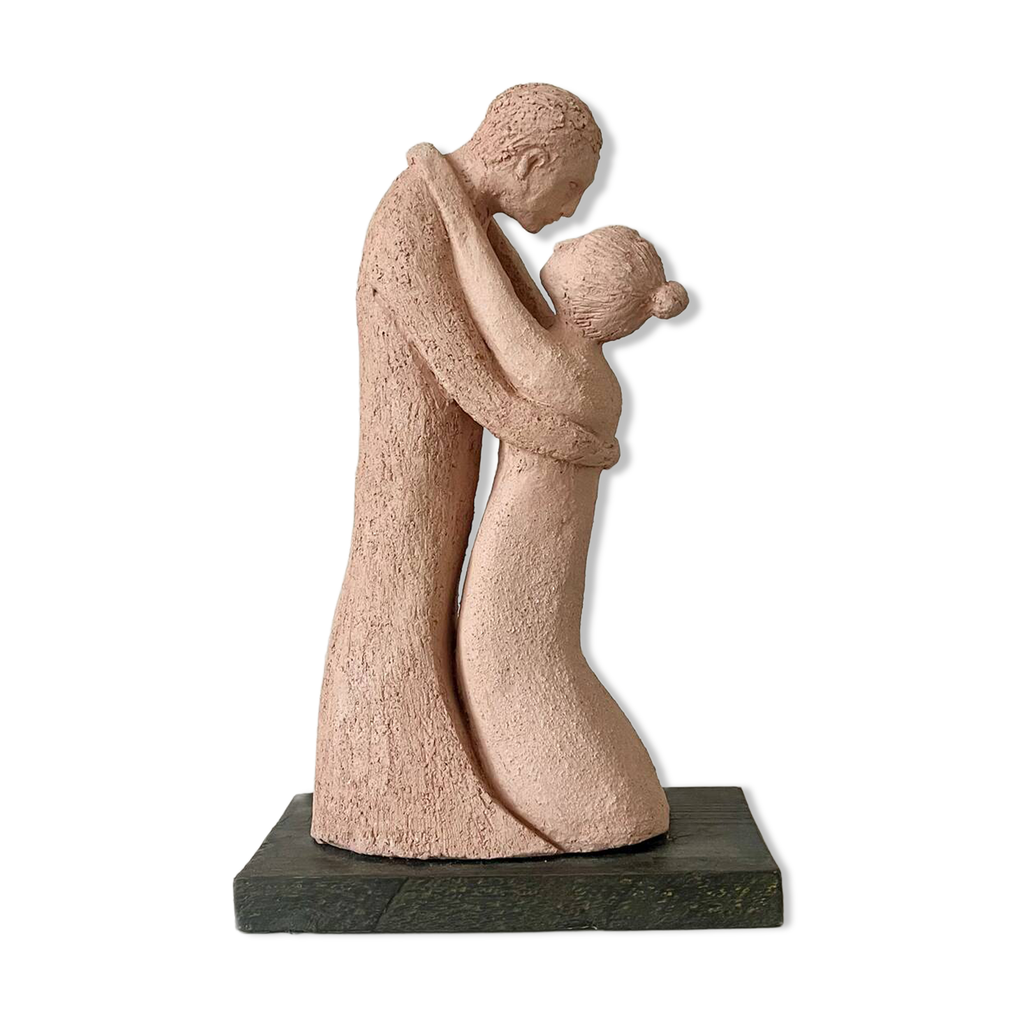 Sculpture of a couple entwined in grog clay.