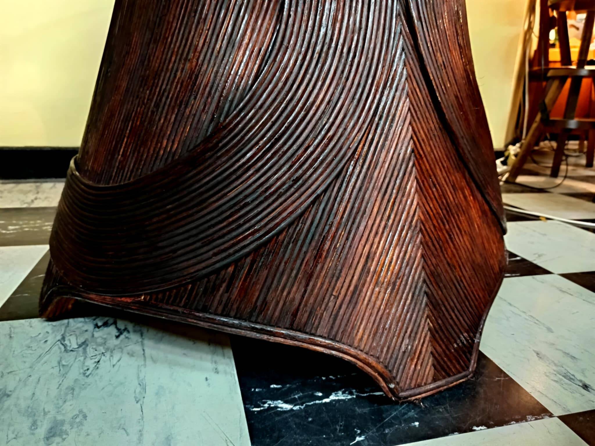 Dining table with rattan marquetry