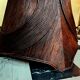 Dining table with rattan marquetry