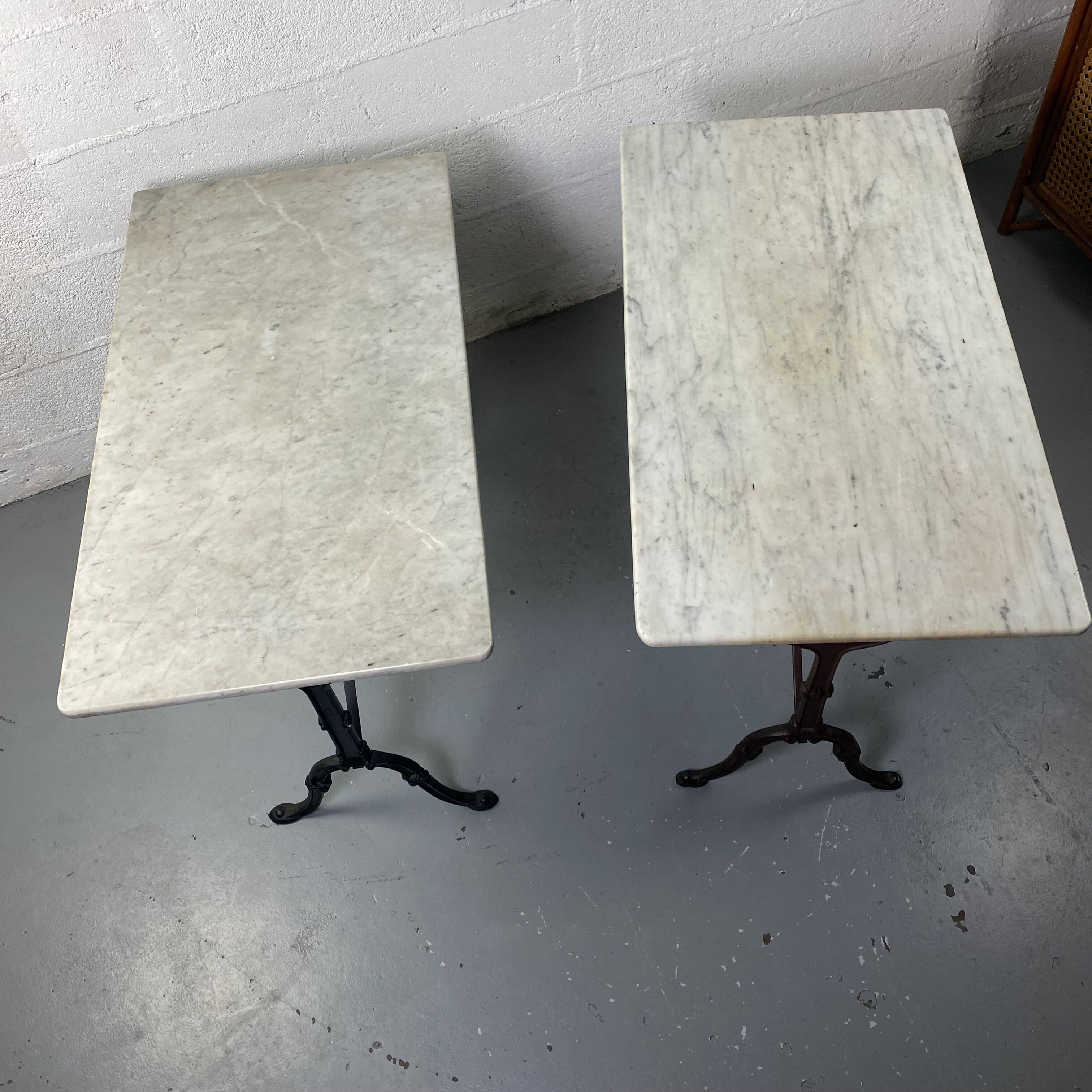 Set of two bistro tables in marble and wrought iron