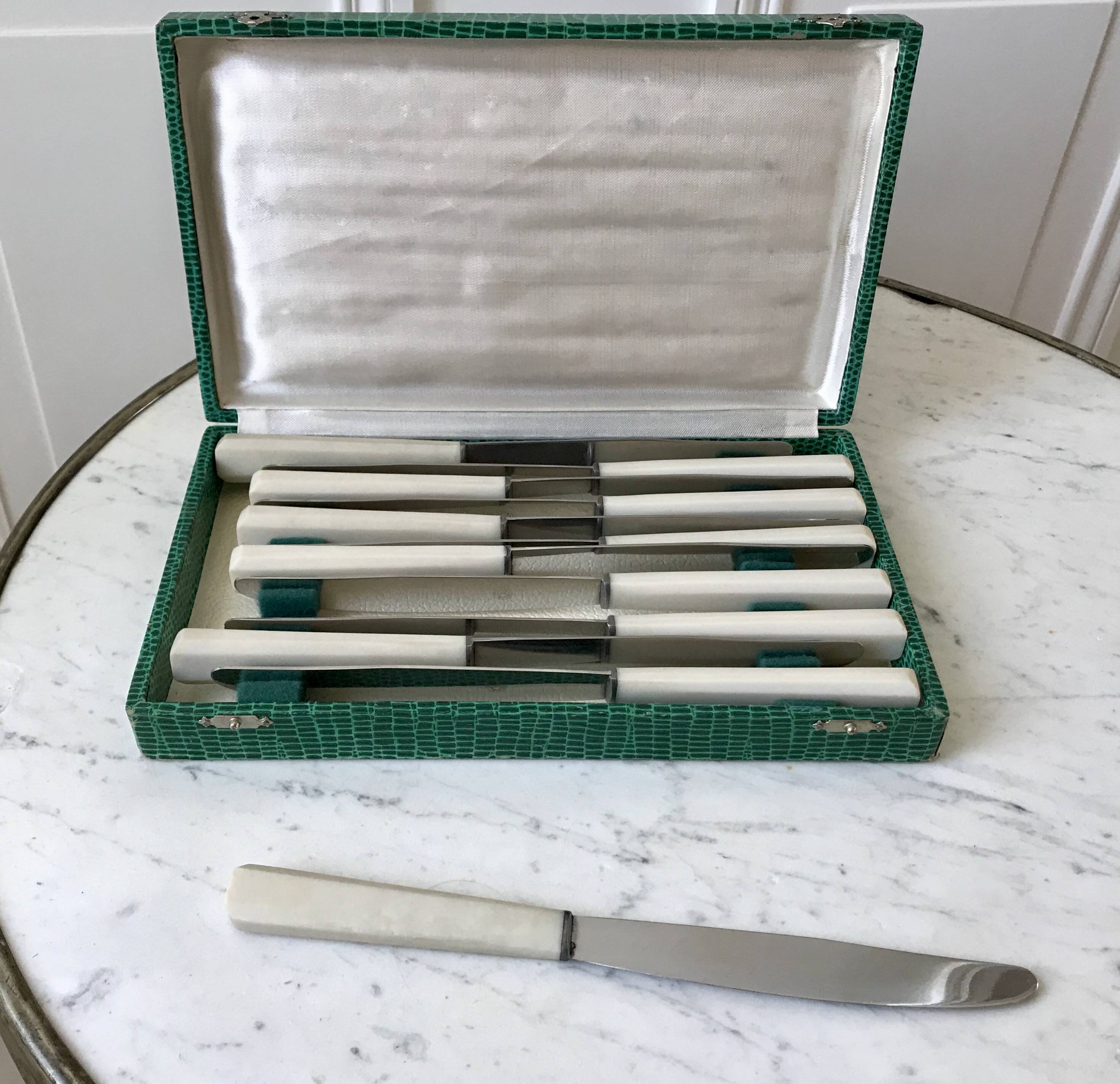 set of 12 bakelite knives from the 60s