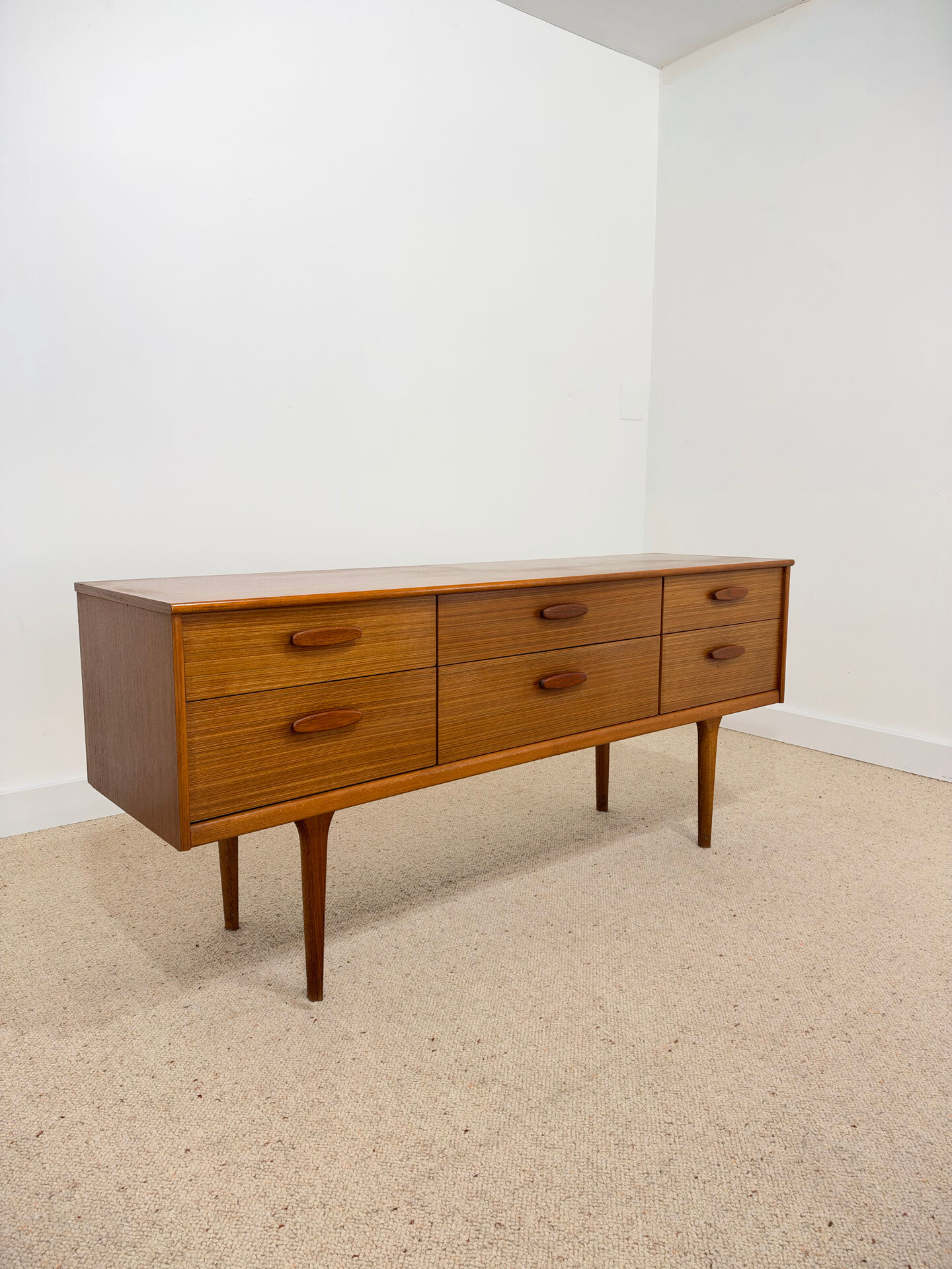 Low enfilade Austin Suite in teak – 1960s