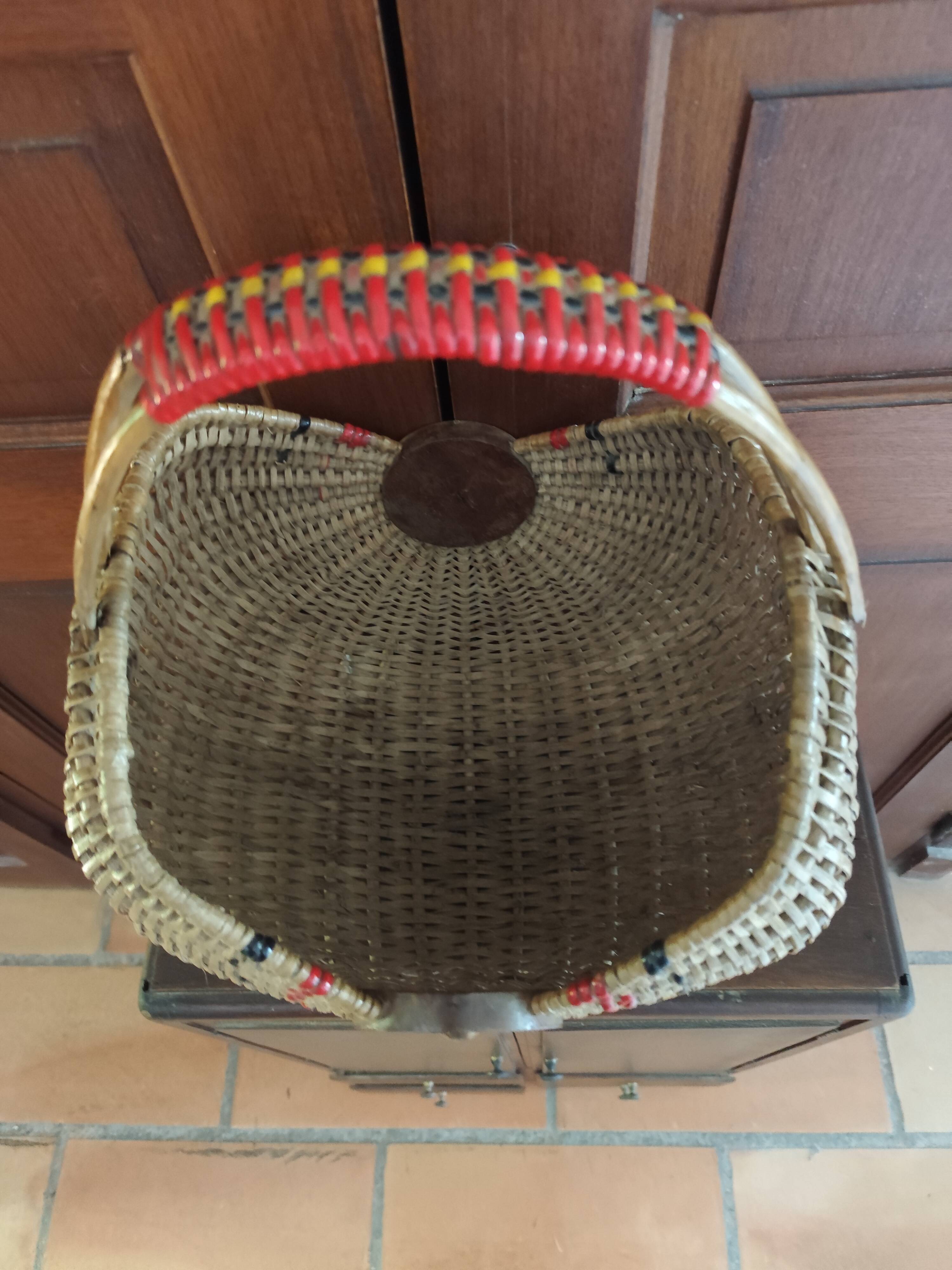 Large antique half-moon rattan basket