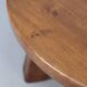 Large vintage round coffee table in raw oak brutalism.