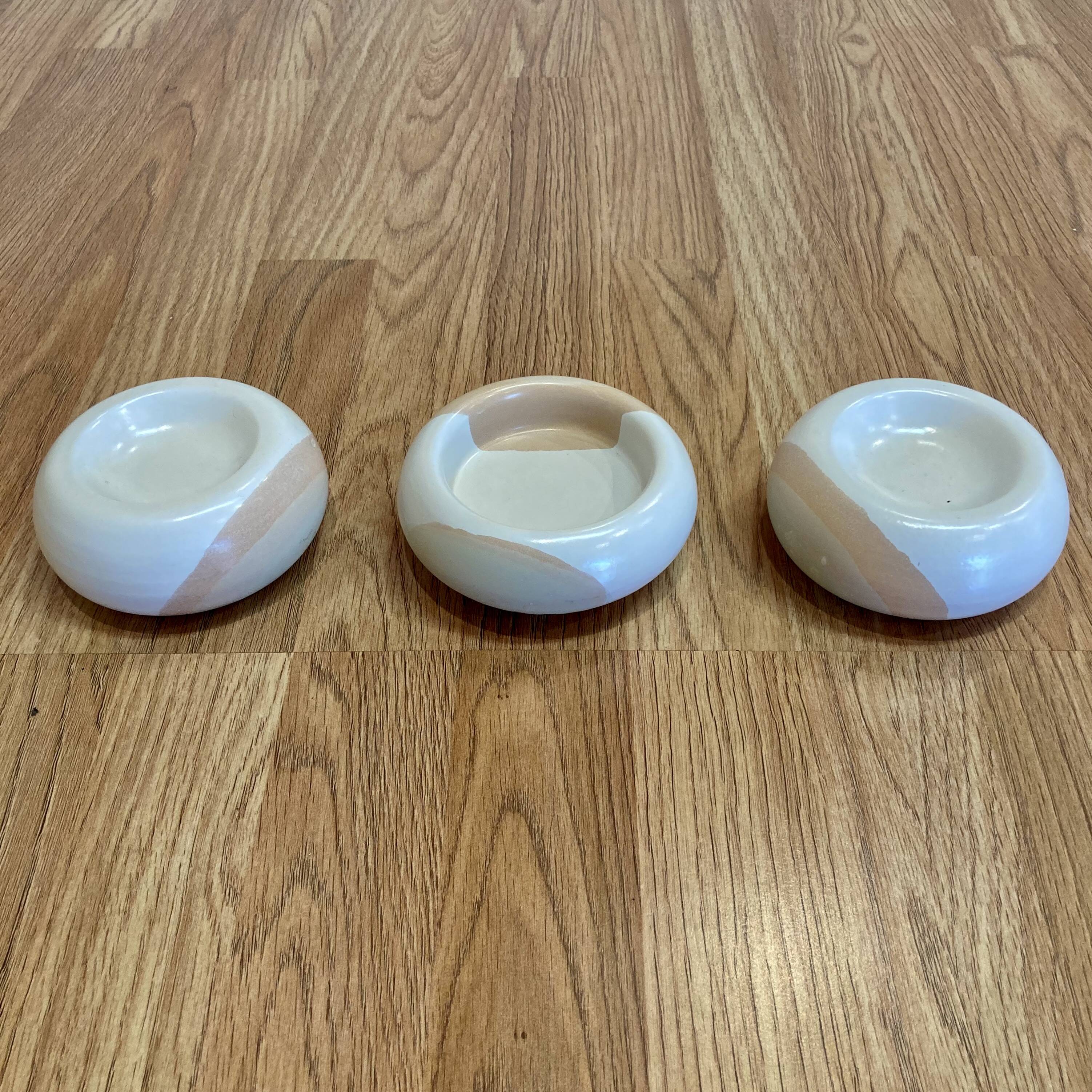 Handmade trio of candle holders.