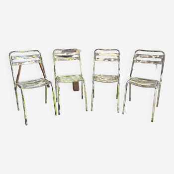 Suite de 4 chaises en métal années 50