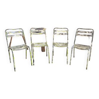 Suite de 4 chaises en métal années 50