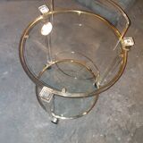Round table in glass and brass and acrylic columns, 1980