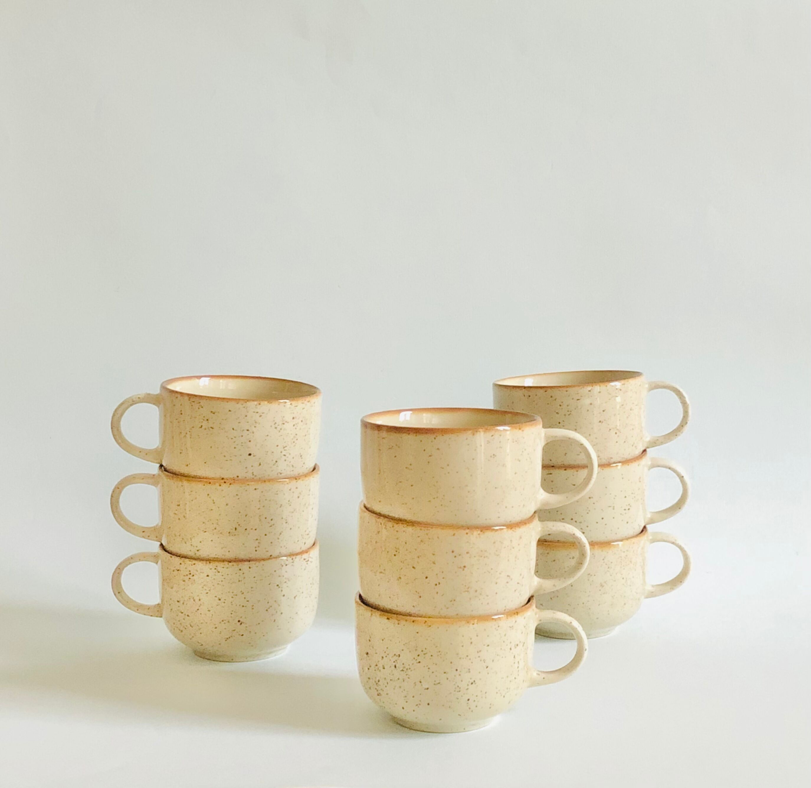Set of 9 speckled ceramic coffee cups