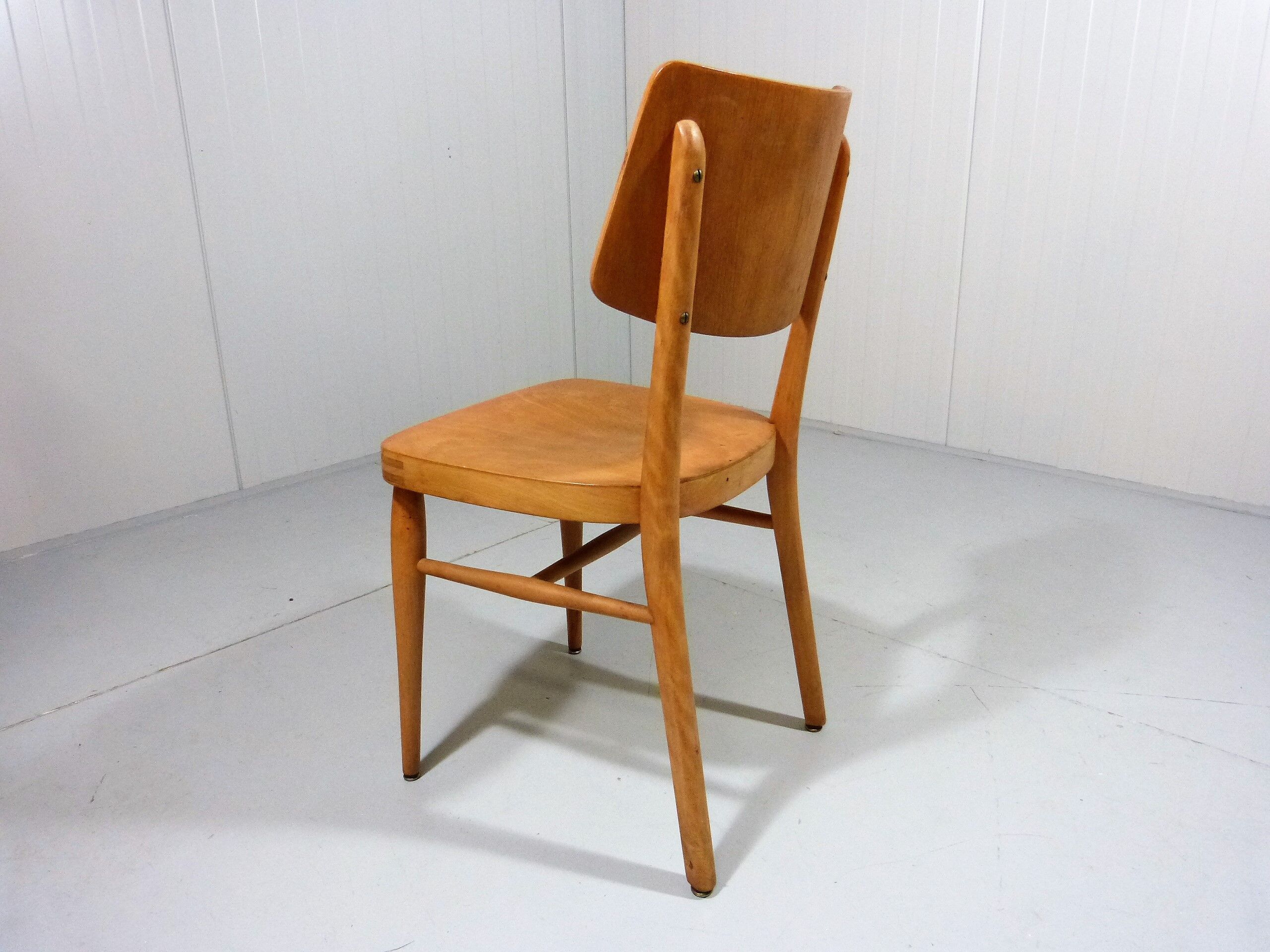 Set of 8 wooden dining chairs 1950’s