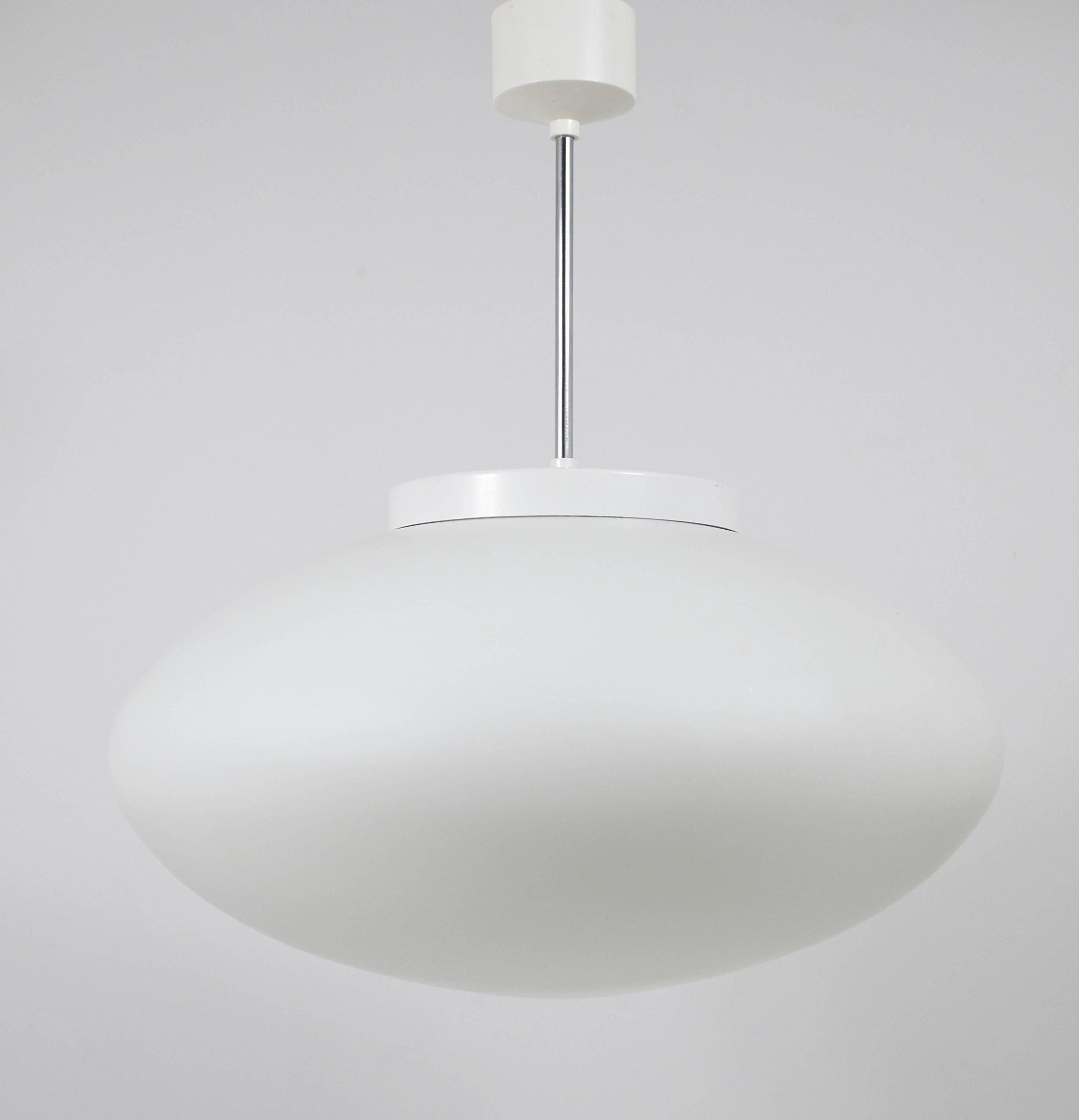 Up to 40 huge elliptical opaline glass pendants, in the style of Lisa Johansson-Pape.