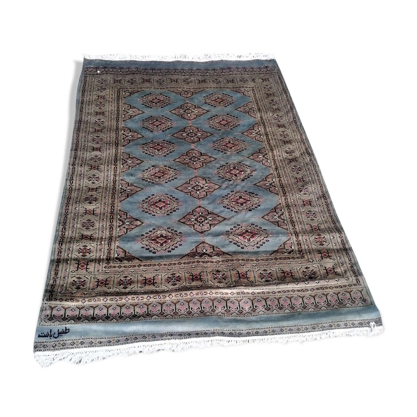 Old oriental carpet made hands. Signature. (175 x 125 )