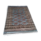 Old oriental carpet made hands. Signature. (175 x 125 )