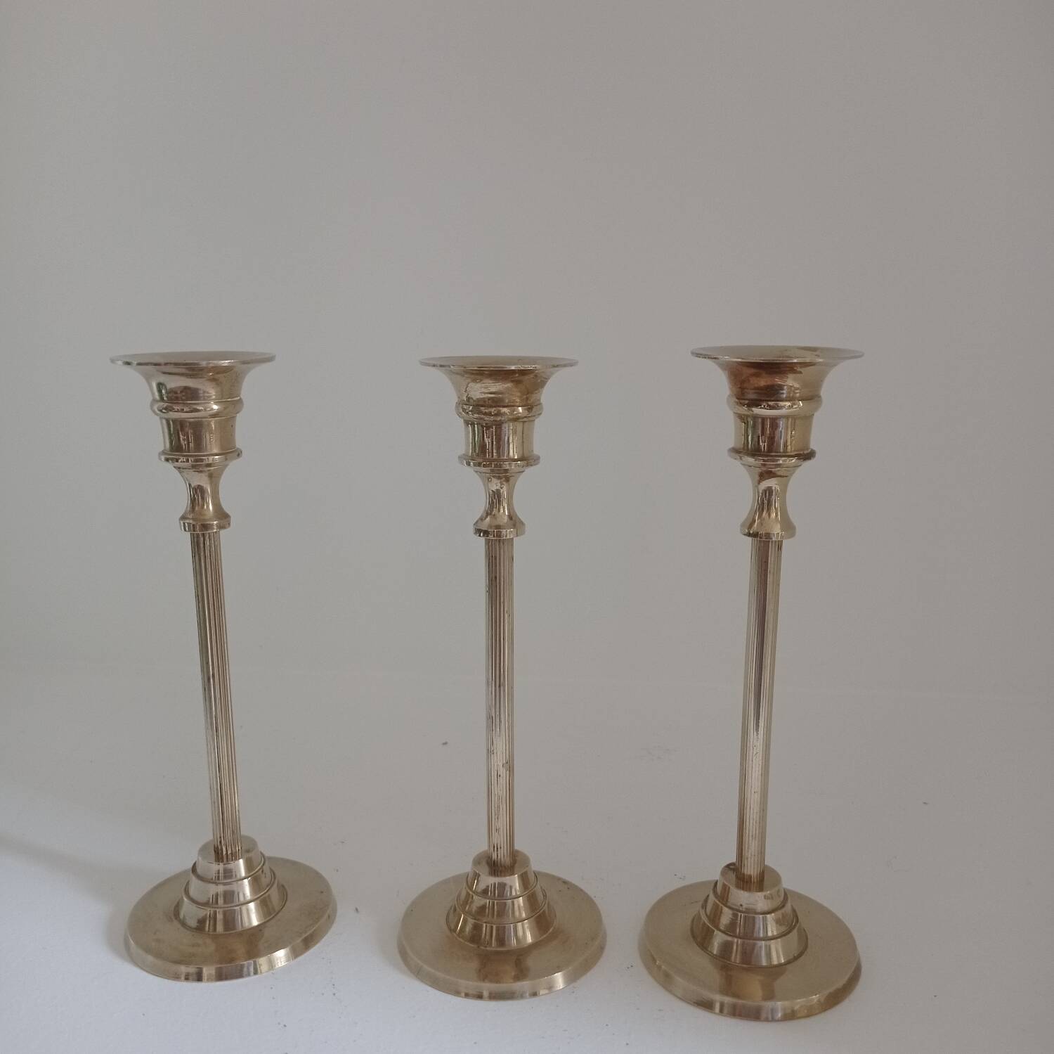 Set of 3 golden brass candle holders