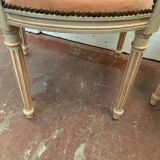 Pair of Louis XVI style armchairs in 20th century patinated beech