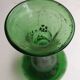 Green blown glass vase from the early 20th century.