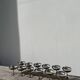 10 stainless steel cups signed Rémy Letang
