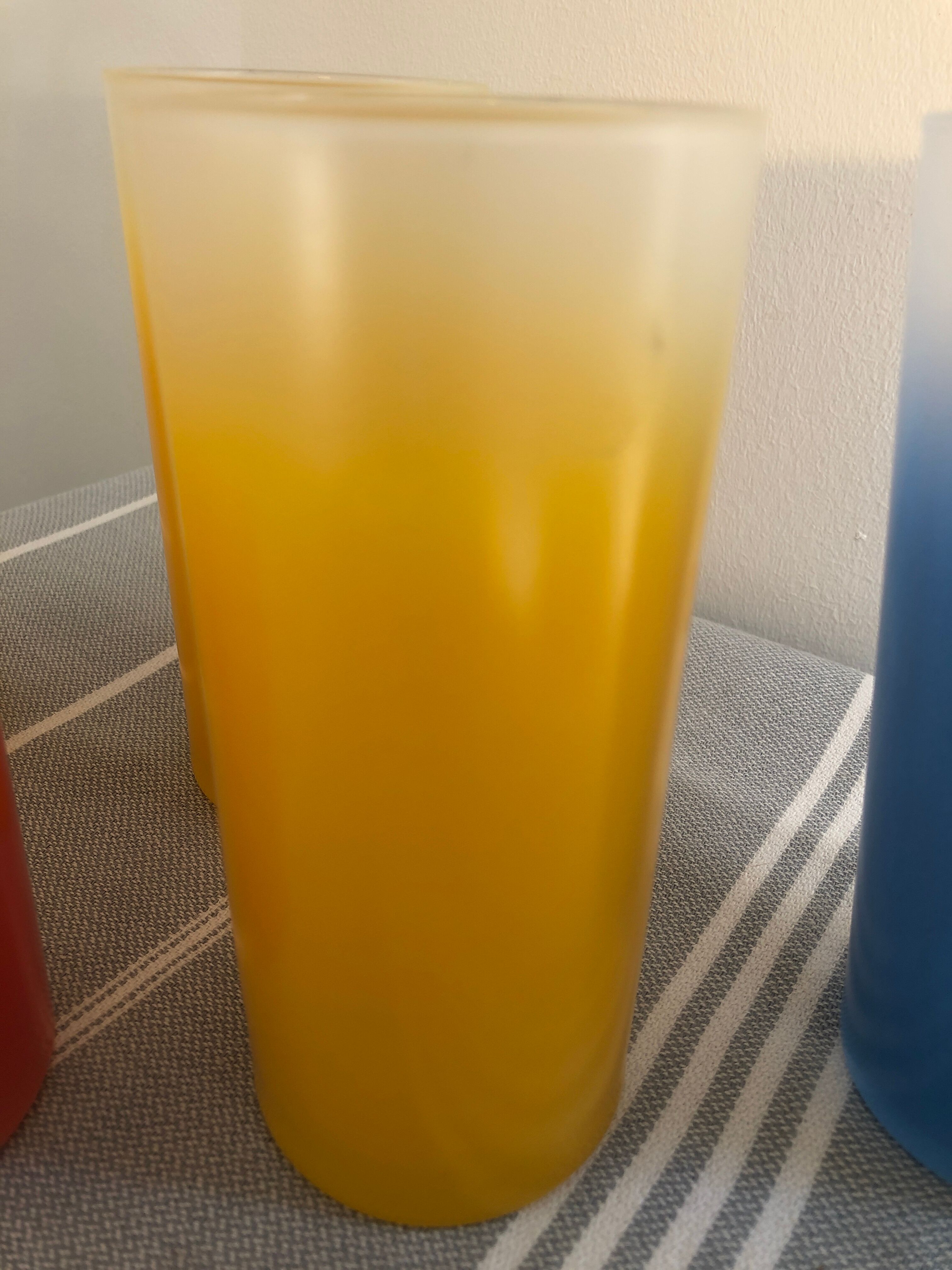 Yellow, red and frosted yellow orangeade glasses made of vintage glass