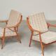 Pair of Boomerang-style armchairs in ecru beige fabric, 1960s.