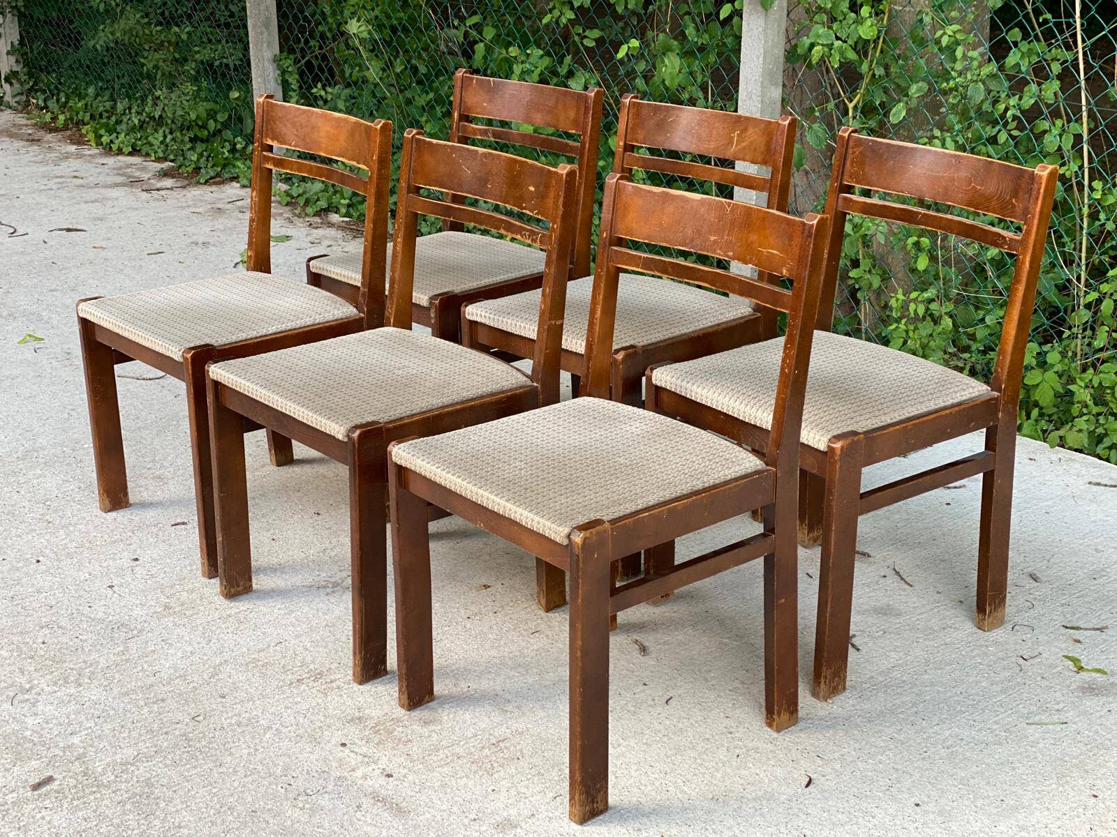 6 Scandinavian Baumann chairs in solid wood and beige fabric.