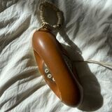 Lady phone in tawny leather