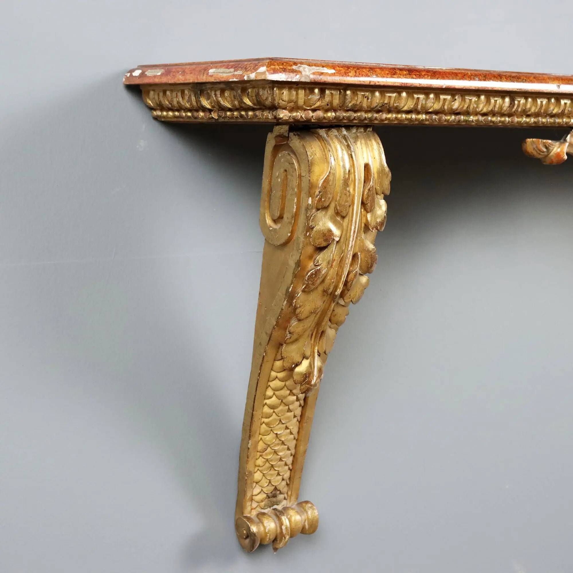 Old carved and gilded wooden console, Italy, 19th century.