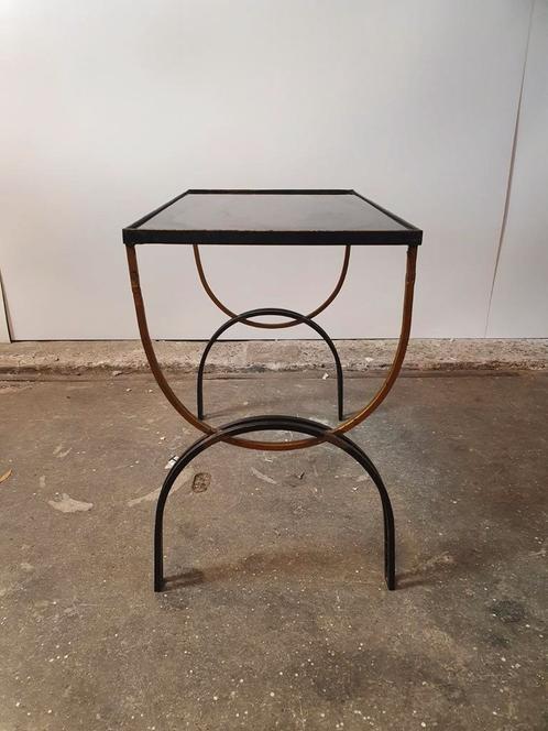 Vintage cast iron and black glass side table
