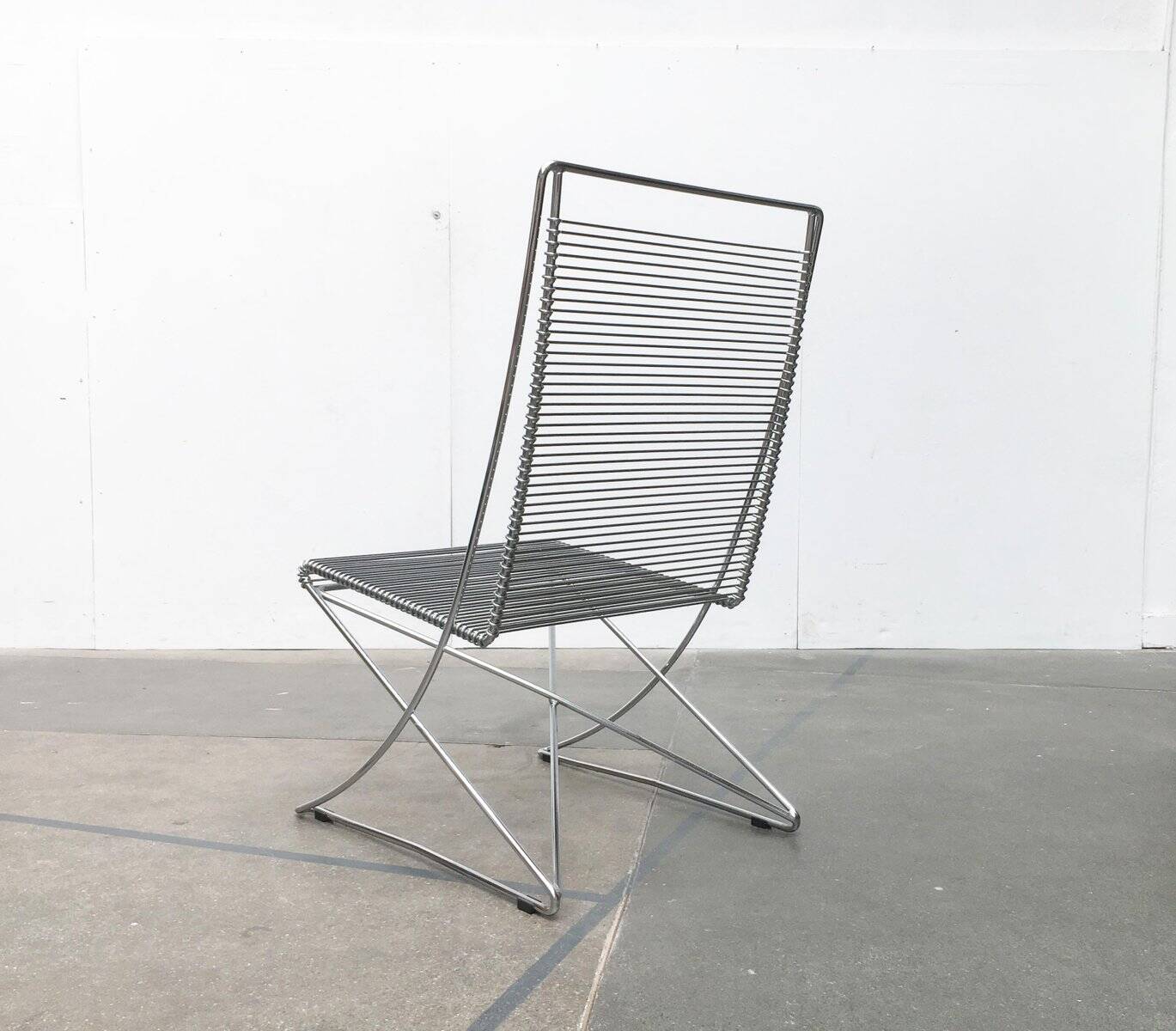 Vintage German Kreuzschwinger lounge chair by Till Behrens for Meyer Stahlmöbel, 1980s.
