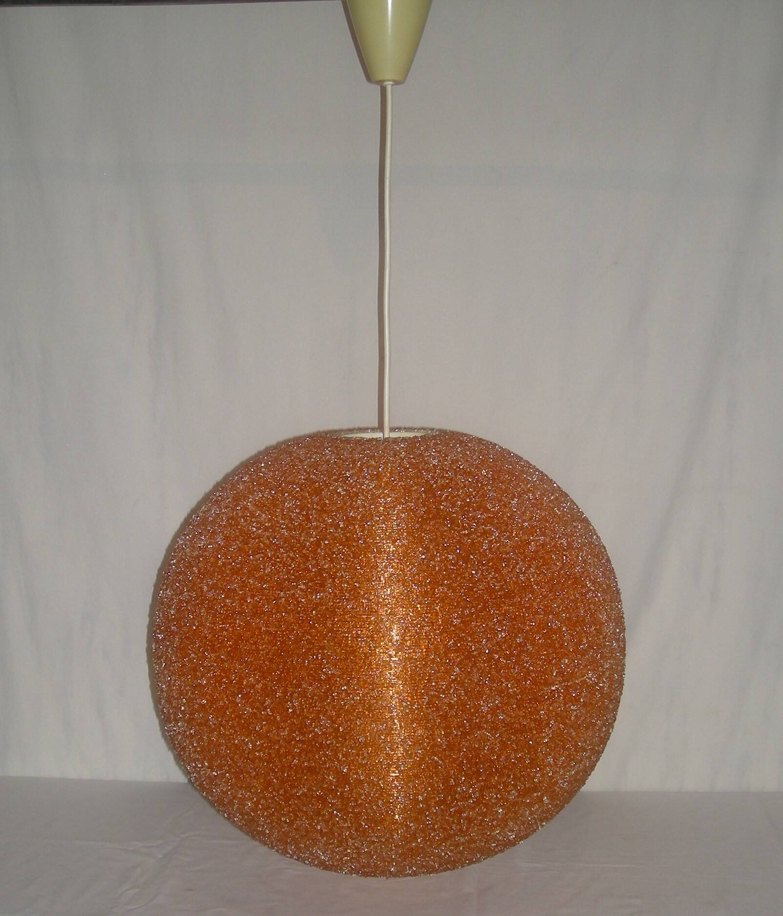 Suspension orange Sugar ball by John and Sylvia Reid from the 1960s.