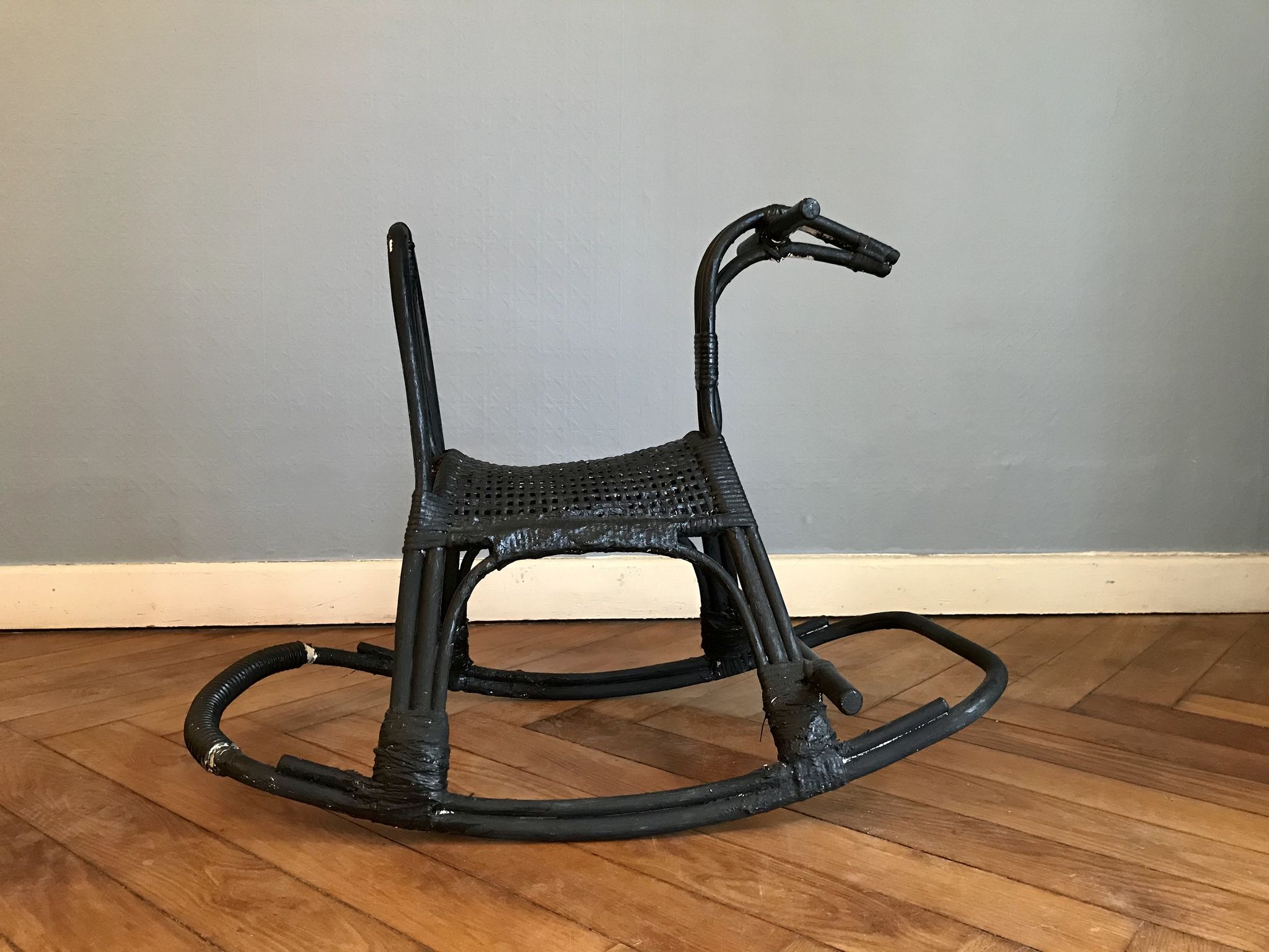 Rocking horse in rattan and bamboo