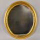 Miroir ovale vintage avec cadre en bois doré