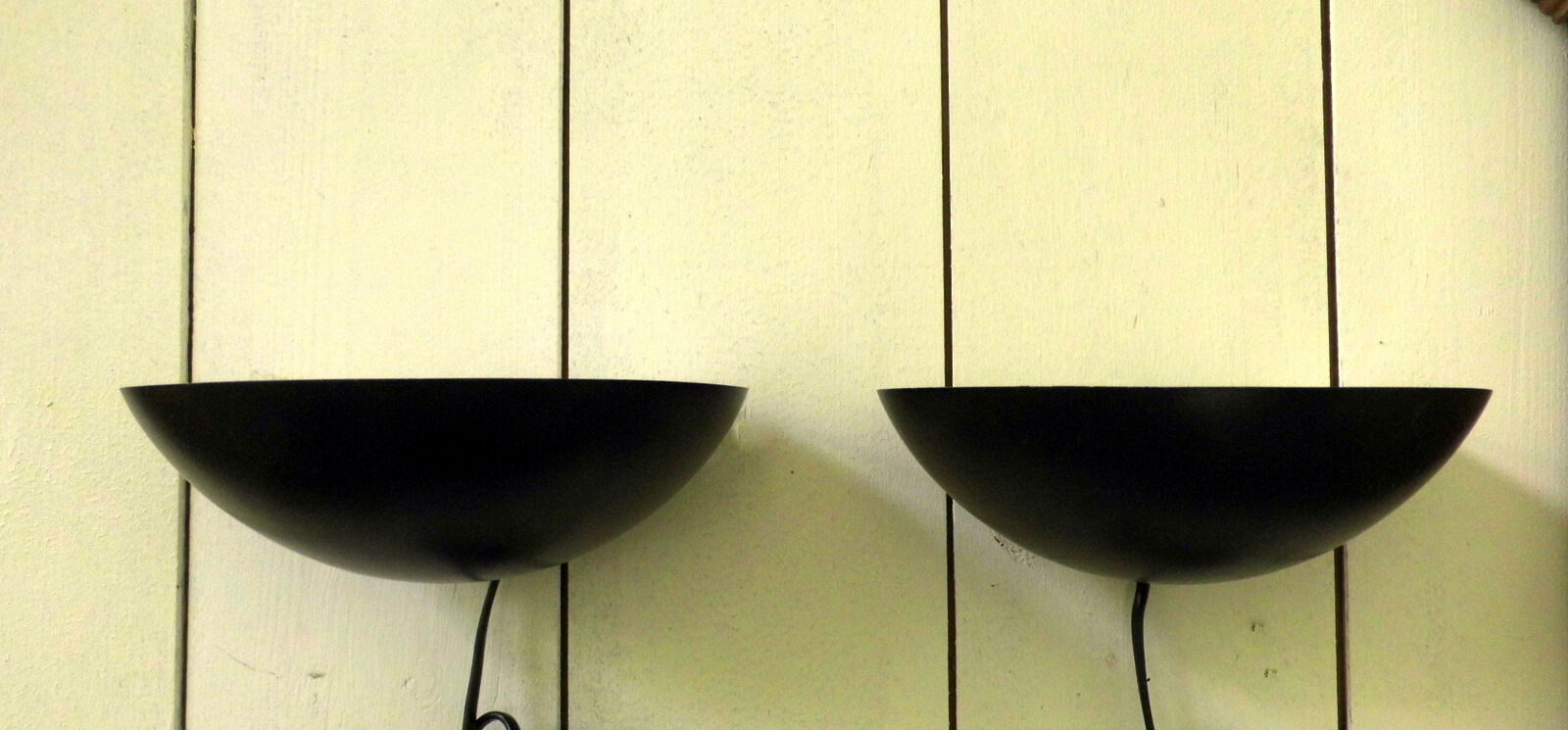 Pair wall sconces in black metal